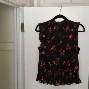 Black floral blouse with ruched bottom